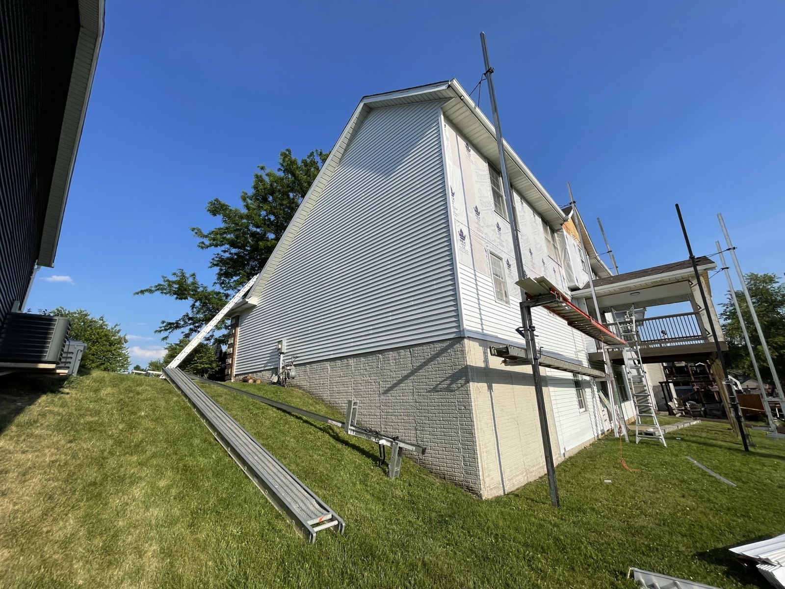 Roof condition assessment showing shingles and flashing on a Pleasant Hill Iowa home