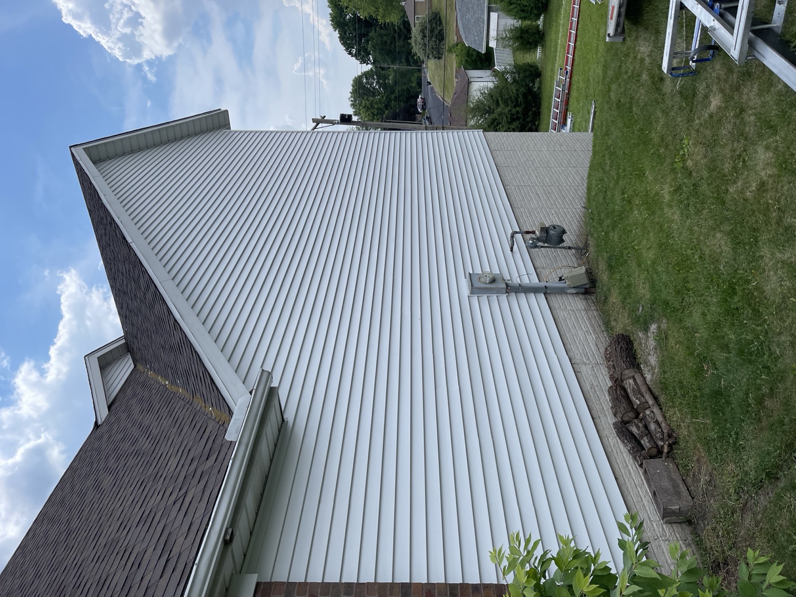 Roof replacement project in progress on a Grimes Iowa home by Black Ridge Contracting