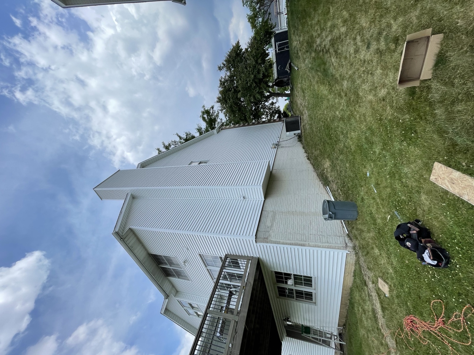 Close-up view of an asphalt shingle roof needing shingle repair in Ankeny Iowa